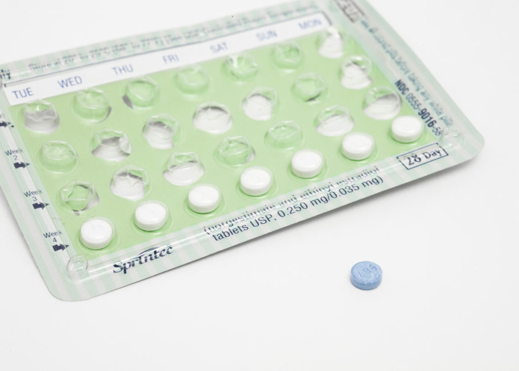 Photo of a birth control pill and the blister pack
